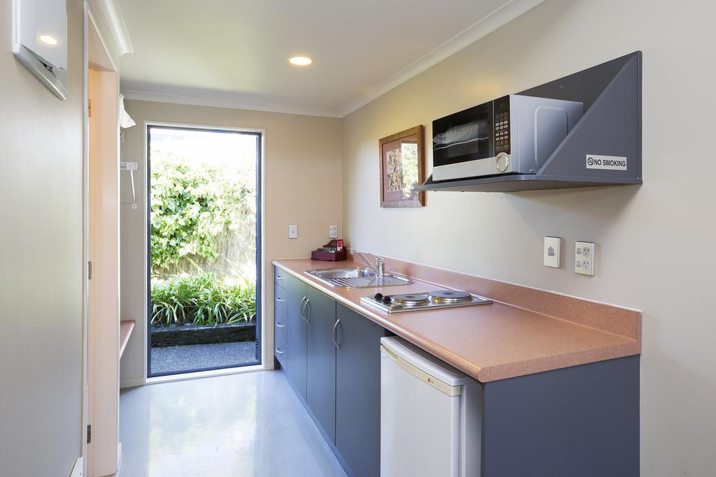 Beach House Motel Papamoa Szoba fotó